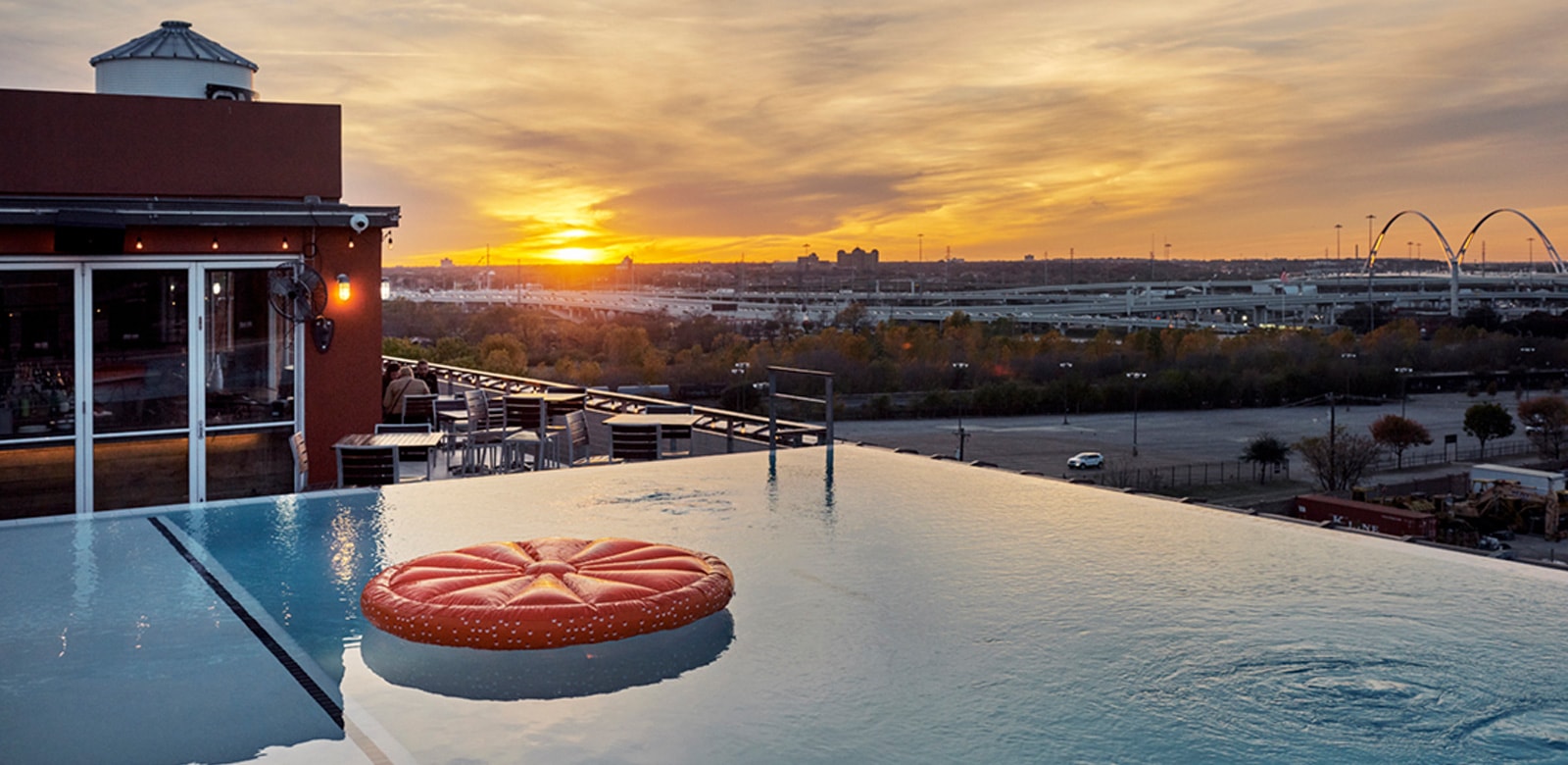 Sunset view from the infinity pool at CANVAS Hotel Dallas